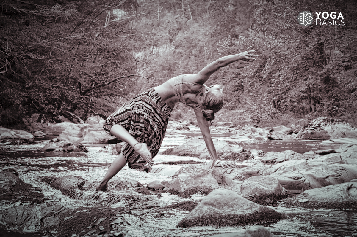 woman doing yoga Balancing Rajas Guna